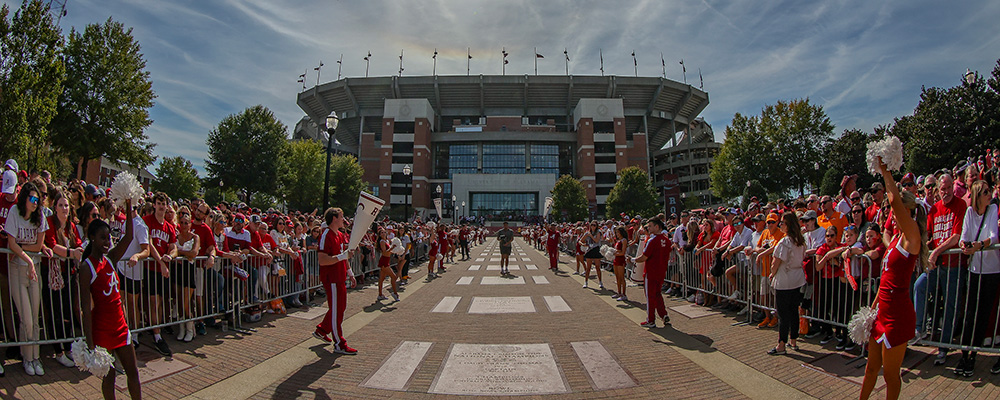 Cheerleaders lining the Walk of Champions in front of Bryant-Denny Stadium