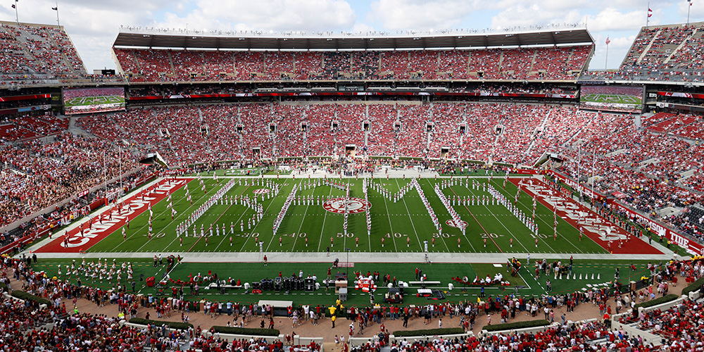 Field at Bryant-Denny Stadium with the band members spelling out Bama
