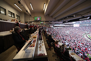 Premium individual seating at a counter with tablets to view game stats