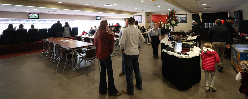 People milling about the buffets that had been set up