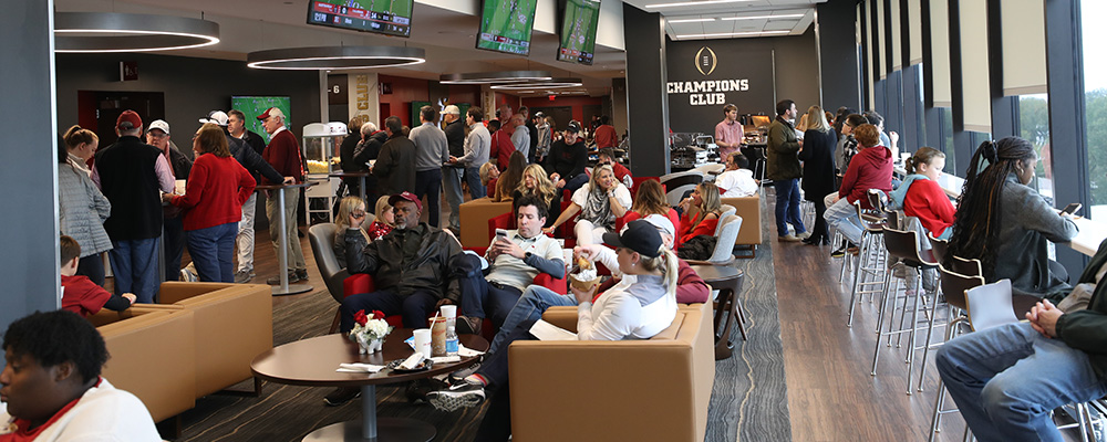 Fans seating in conversation groupings and along a counter lining the windows