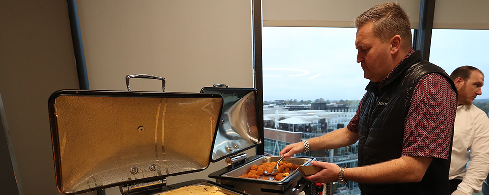 Fan serving himself from a buffet