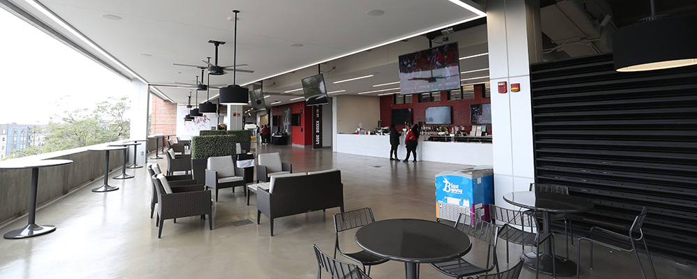 Seating in conversation groups out in the concourse in the Terrace Club