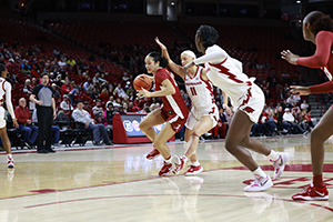 Aaliyah Nye defending the ball against an opposing player