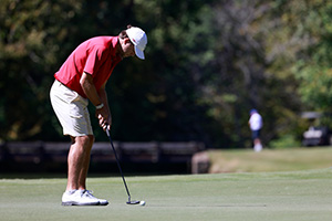 JP Cave putting the ball